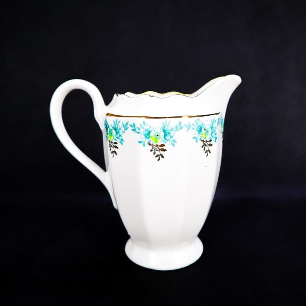 Rubensa krējuma kanniņa zila, deltena puķe